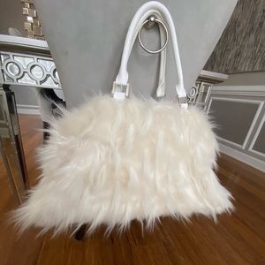 Duffel White Faux Fur Tote
19.5"L x 8"W x 11.5"H